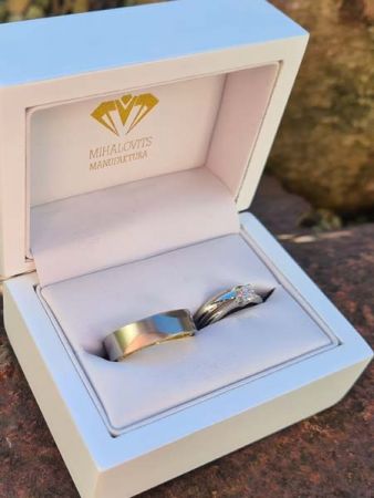 renata and milan titaniu gold wedding ring pair